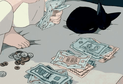Une gamine fait des piles de billets.